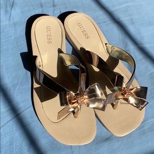 Guess rose gold bow flip flops